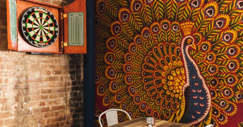 Interior, table for two, picado board on the wall