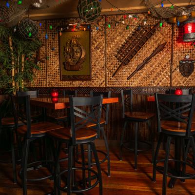 Kapakele Rum Bar, seating area in a tiki bar setting.
