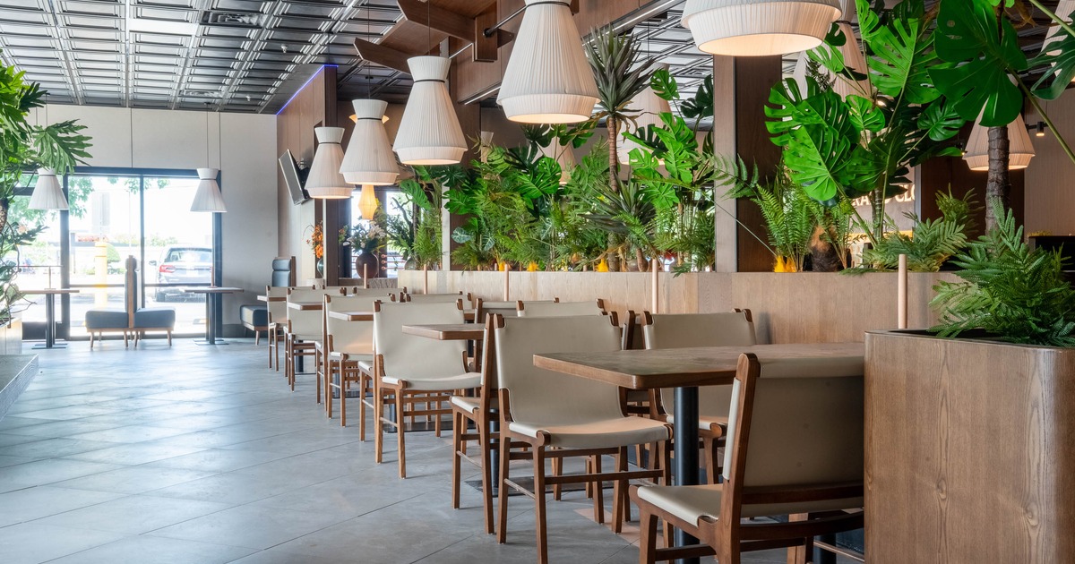 Interior, tables and chairs in seating area