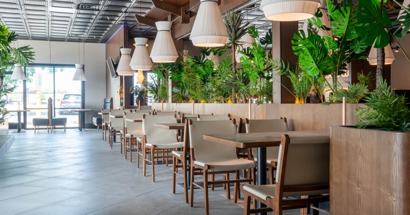 Interior, tables and chairs in seating area