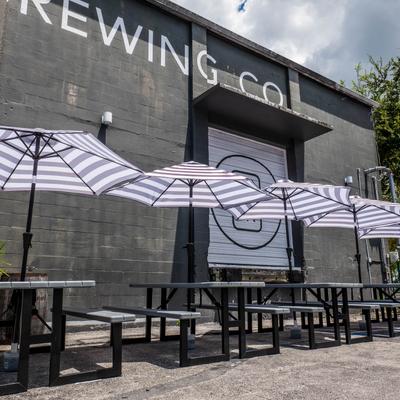 The exterior patio under parasols.