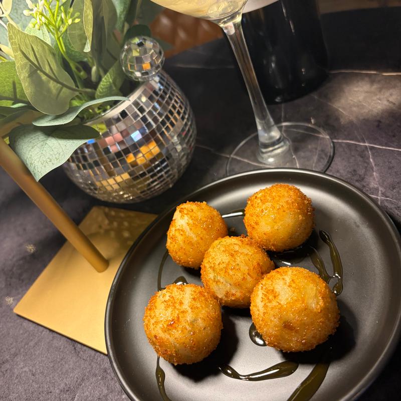 Smoked Gouda Arancini with Hot Honey Drizzle photo
