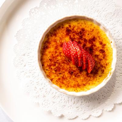 Creme Brulee, topped with strawberries.