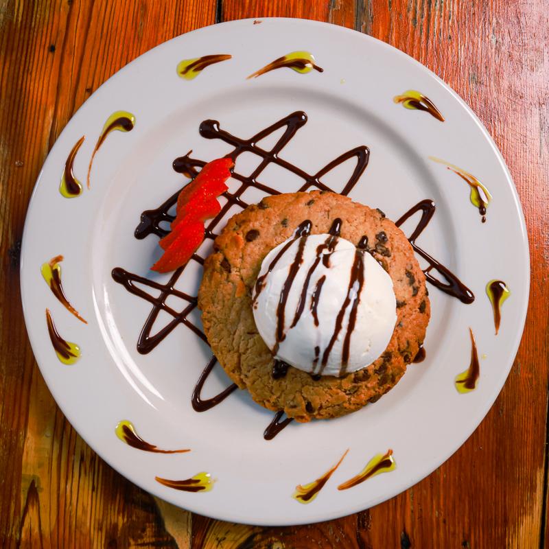 Warm Chocolate Chip Cookie w/ Vanilla Ice Cream photo