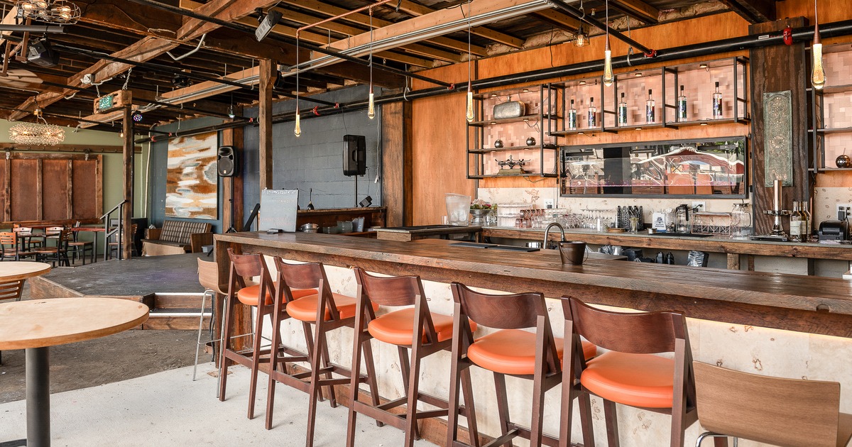 Interior, bar stools, drink rack, front view