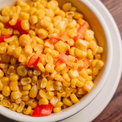 Sweet corn and peppers, top view closeup.