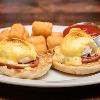 Eggs Benedict and tater tots.