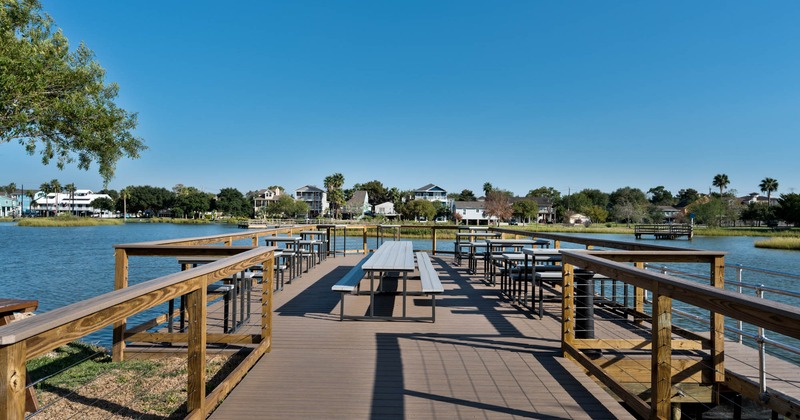 Outdoor seating area on deck near water
