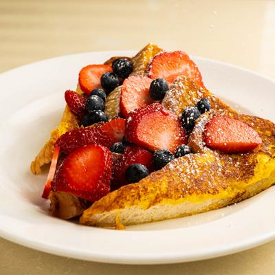 French toast topped with berries.