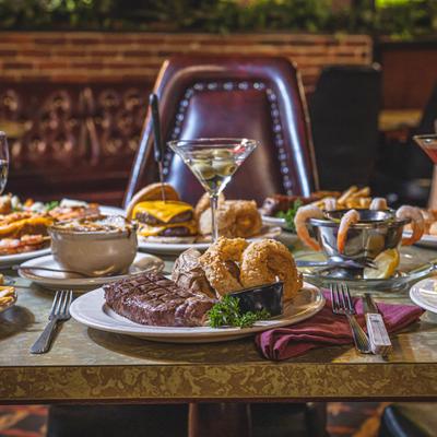 Assorted dishes spread on the table, side view