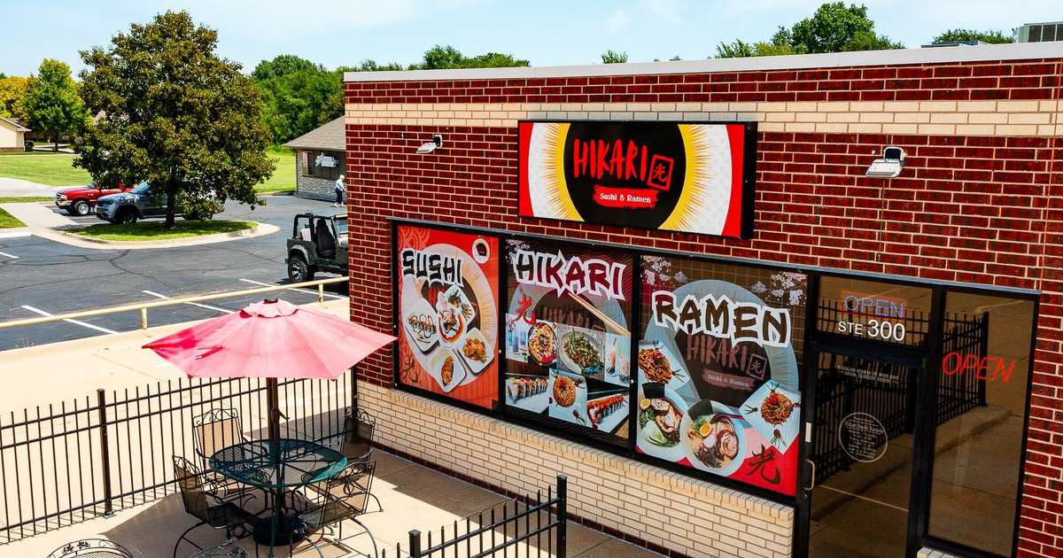 Exterior, tables and chairs near the entrance