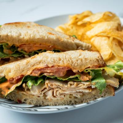 Chipotle chicken sandwich, served.