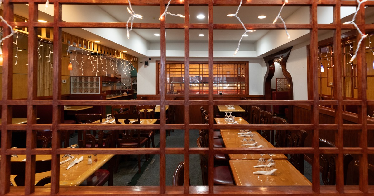 Interior, seating area with wooden decorative wall separator
