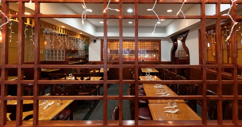 Interior, seating area with wooden decorative wall separator