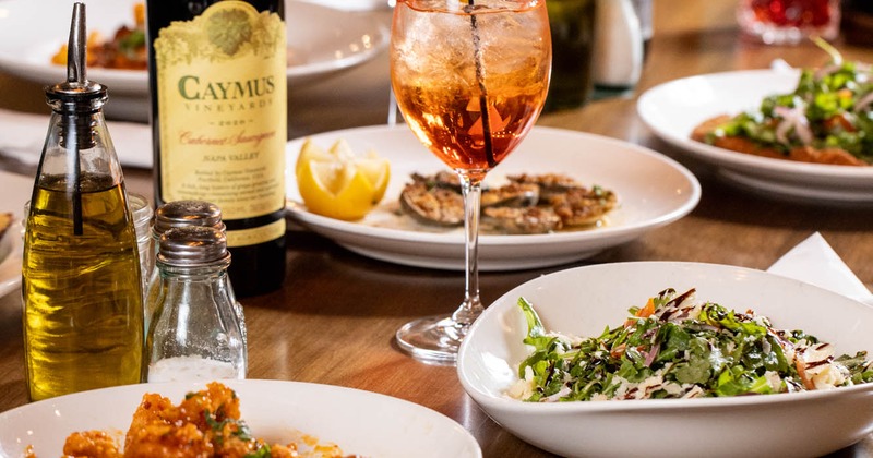 Tablescape with served assorted dishes and drinks