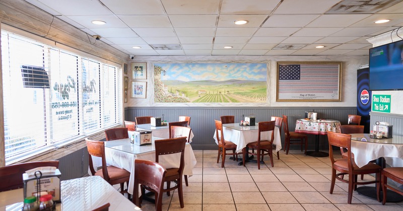 Interior, seating area with tables and chairs