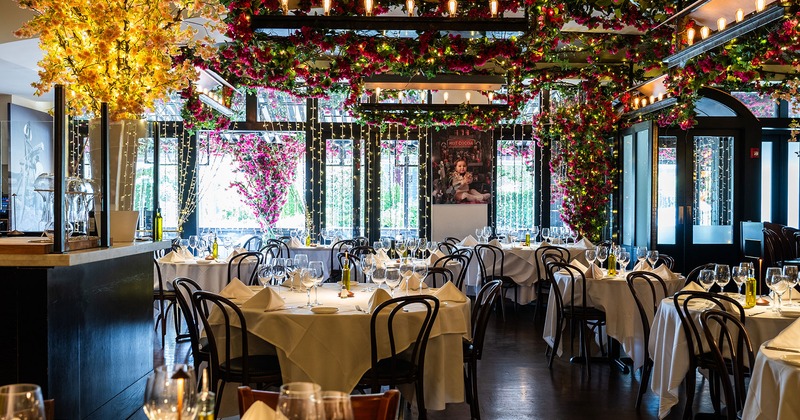 Restaurant interior, dining area with tables ready for guests