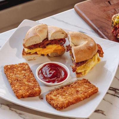 Served Bacon, eggs, and cheese sandwich.