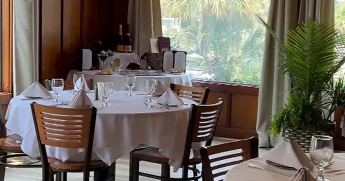 Interior, dining table ready for guests