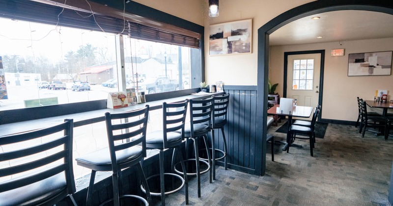 Bar table and stools by the window