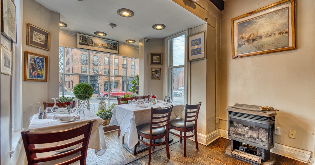 Interior, elegant dining space, art on walls