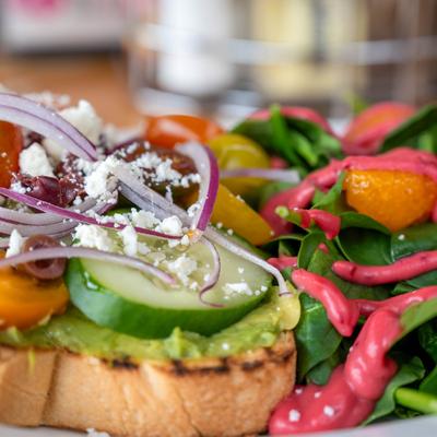 Avocado caprese toast, close up.