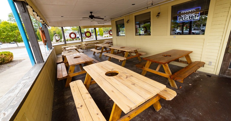 Picnic tables with a hole in the middle