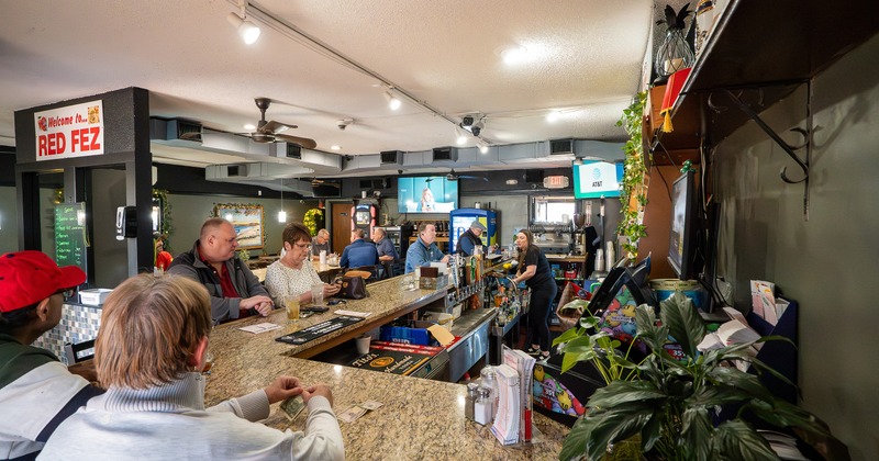 Interior space, bar counter with guests