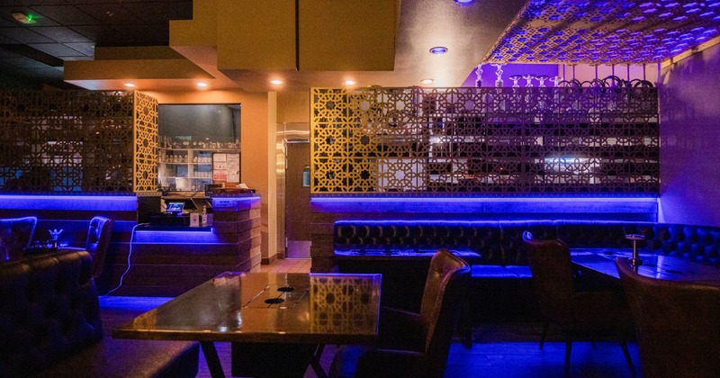 Interior with leather booths, tables and chairs