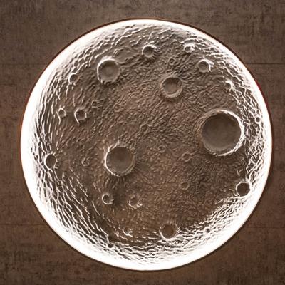 Moon wall lamp in a dining area.