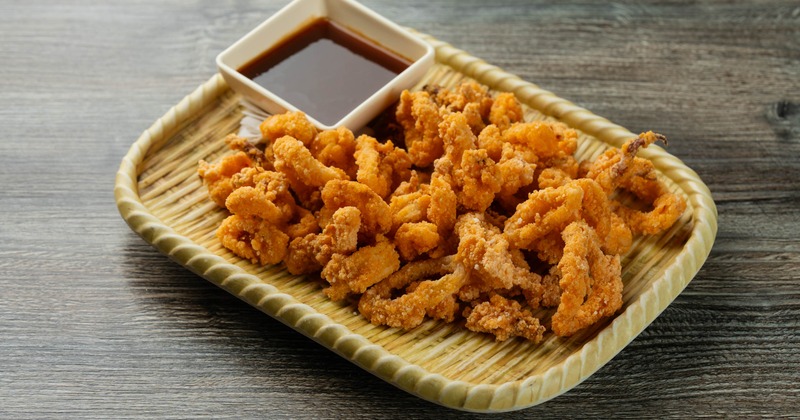 Fried calamari served with a dipping sauce