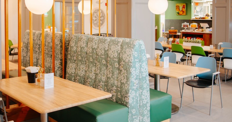 Seating area with tables and booths