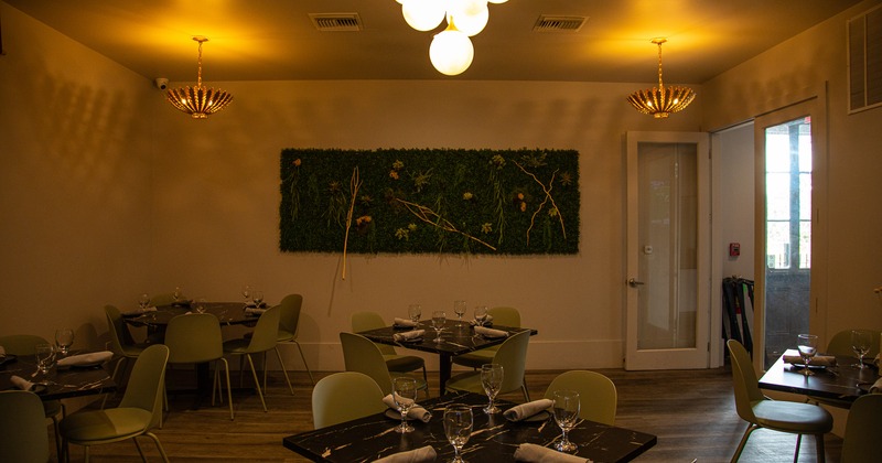 Cozy interior dining area with set dining tables