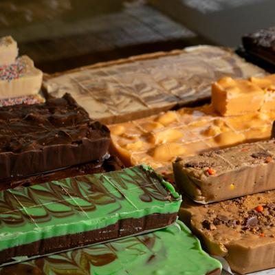 A variety of fudge flavors on display.