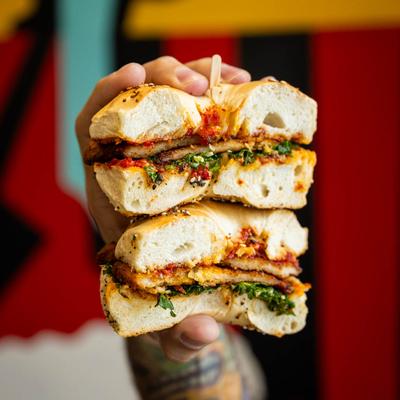Nashville fried chicken sandwich, with tomato aioli, and asiago kale salad.