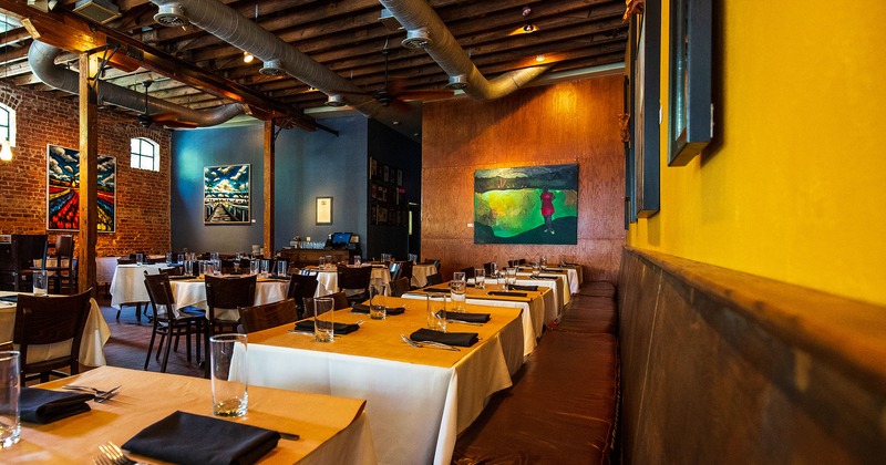 Interior, set tables ready to receive guests