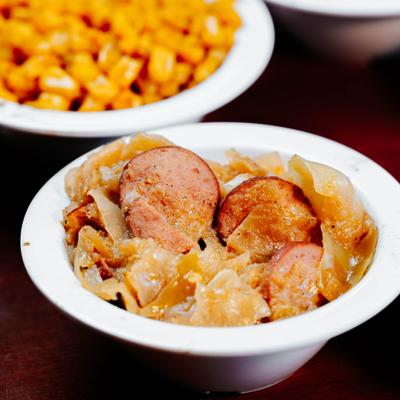 Fried cabbage with sausage.