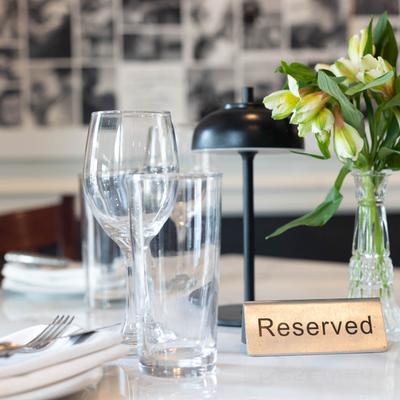 A reserved dining table.