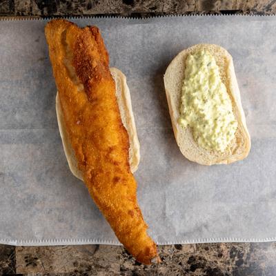 Fried fish sandwich, with tartar sauce.