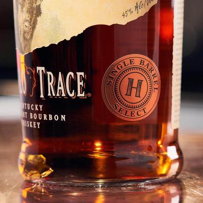 Close up of a bottle of Buffalo Trace Kentucky Straight Bourbon Whiskey.
