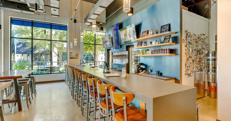 Bar area, neatly lined up bar stools