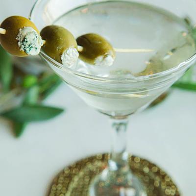 Martini with stuffed olives.