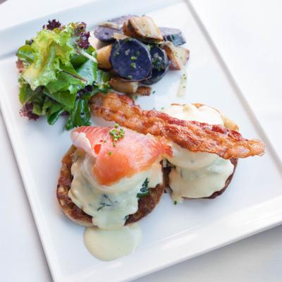 Decorated grilled meat, smoked meat, bacon, green vegetables on the side