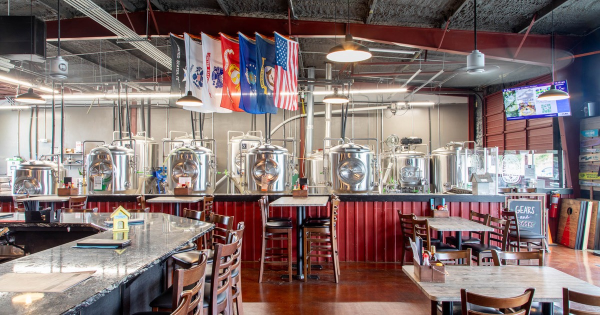 Interior, tables and chairs, beer tanks in the back