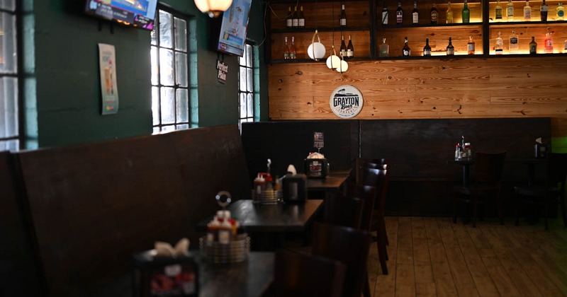 Interior, banquette seating area, tables and chairs