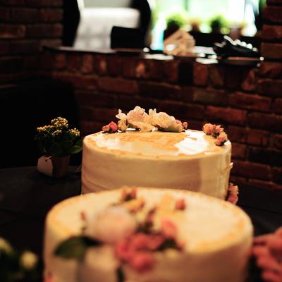 Two whole cakes served on table.