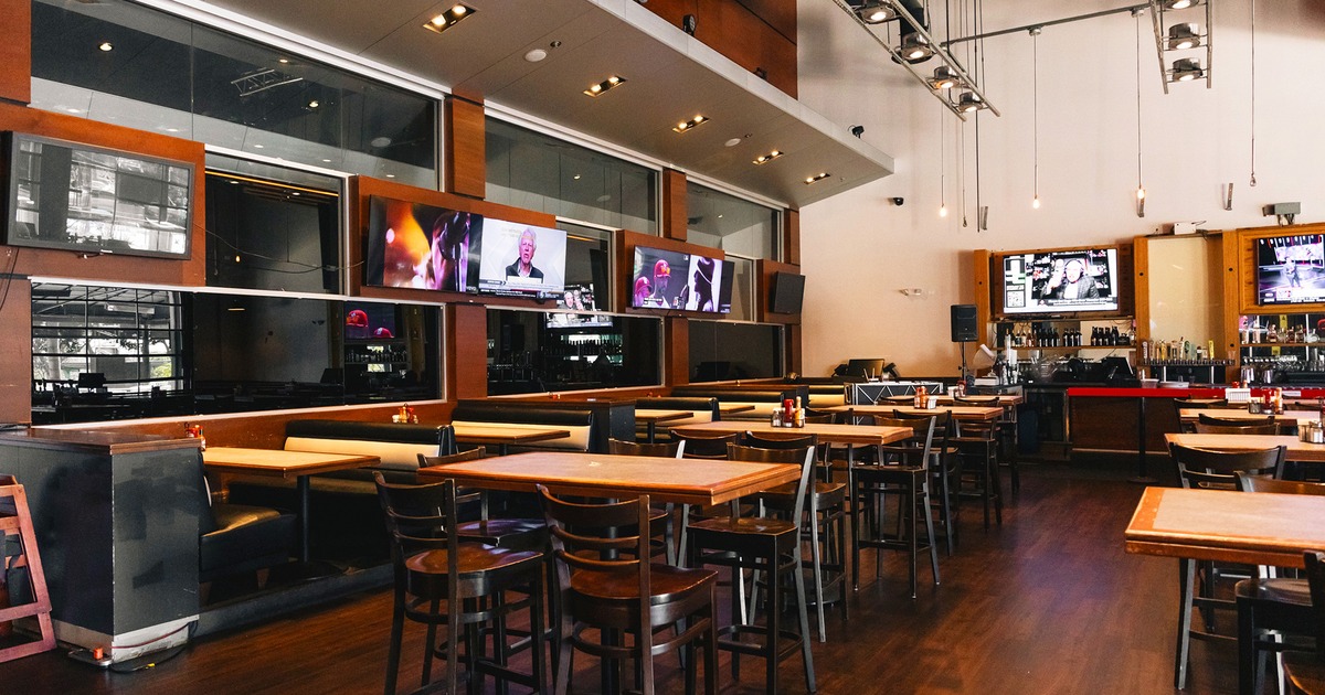 Interior, seating area, booths and tables lined up
