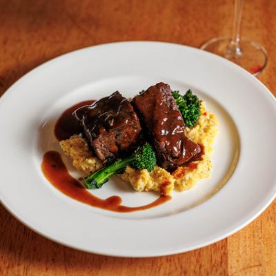 Prime Rib with mashed potatoes, broccoli, and sauce