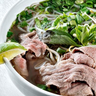 Vietnamese beef noodle soup, close-up.