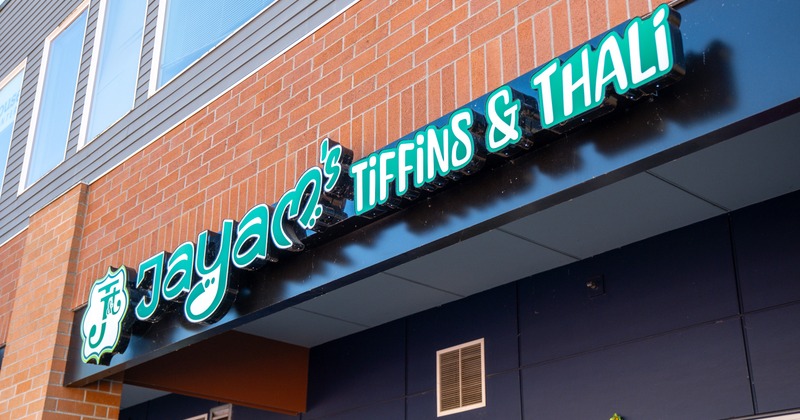 Exterior, sign above entrance, angle view